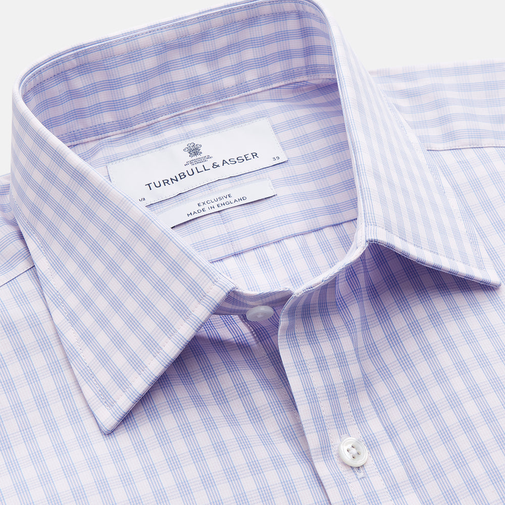The Turnbull & Asser Lilac Multi Check Cotton Regular Fit Mayfair Shirt features a classic T&A collar and button-up design, shown laid flat in a light purple gingham pattern.