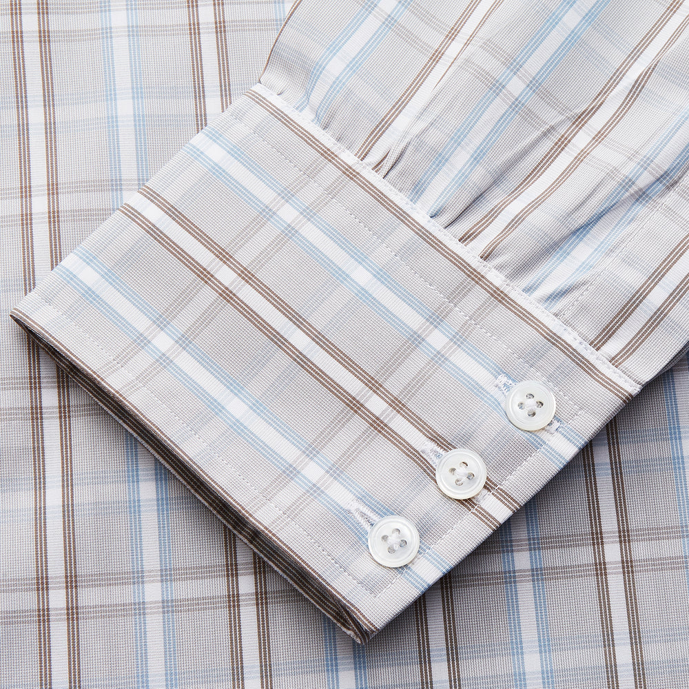 The Beige and Light Blue Check Cotton Regular Fit Mayfair Shirt by Turnbull & Asser features a classic plaid pattern, T&A collar, cuffed sleeves, and button-up front, shown laid flat on a white background.