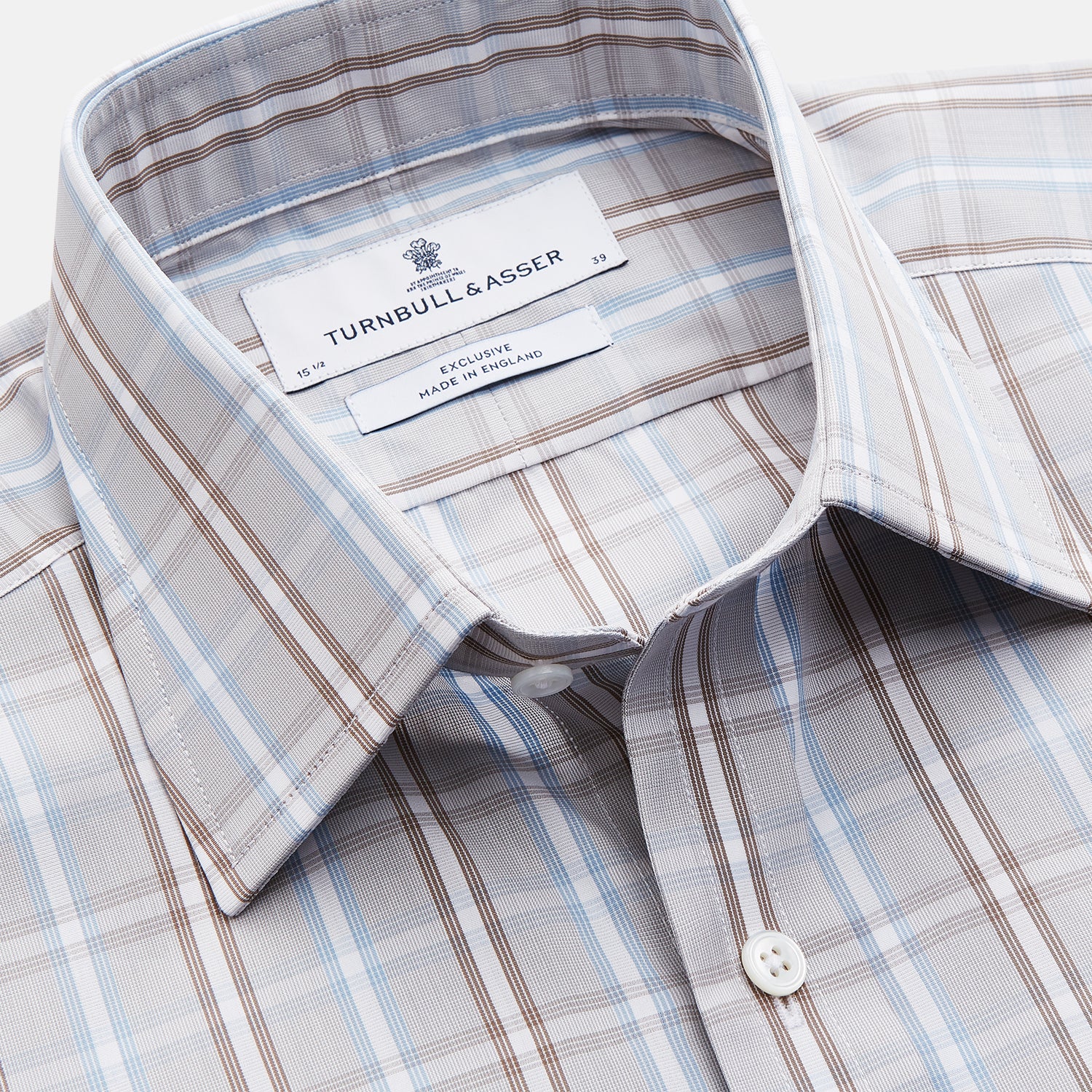 View 2 of product The Beige and Light Blue Check Cotton Regular Fit Mayfair Shirt by Turnbull & Asser features a classic plaid pattern, T&A collar, cuffed sleeves, and button-up front, shown laid flat on a white background.