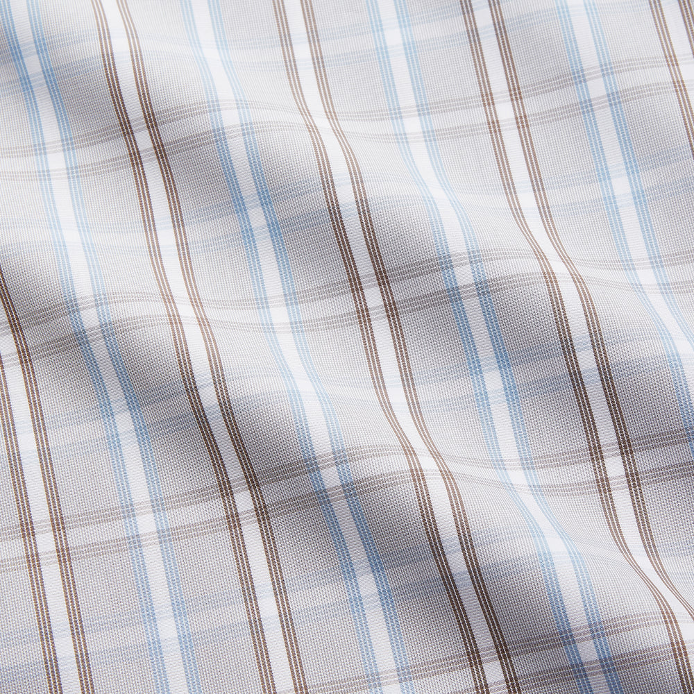 The Beige and Light Blue Check Cotton Regular Fit Mayfair Shirt by Turnbull & Asser features a classic plaid pattern, T&A collar, cuffed sleeves, and button-up front, shown laid flat on a white background.