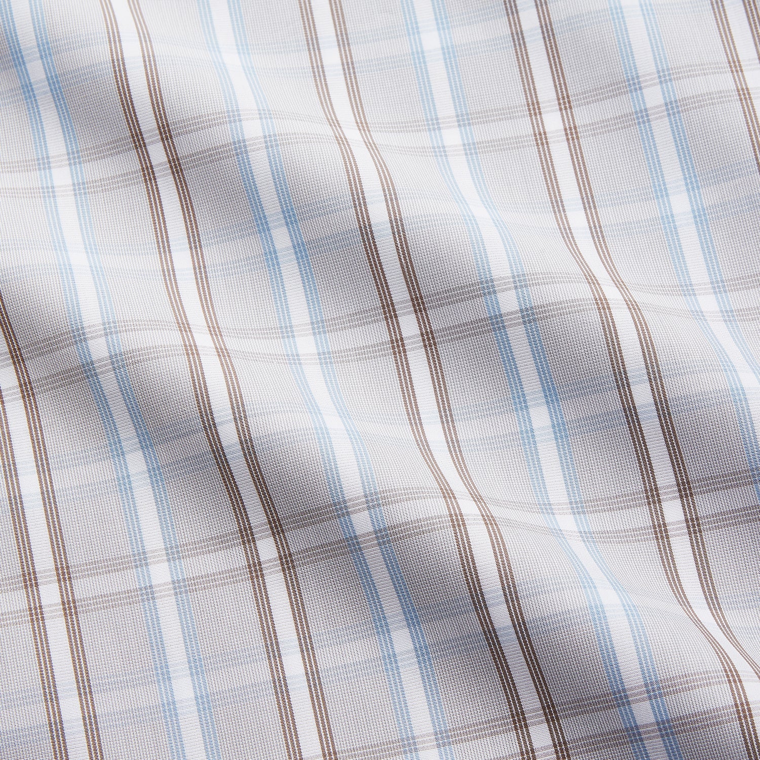 View 5 of product The Beige and Light Blue Check Cotton Regular Fit Mayfair Shirt by Turnbull & Asser features a classic plaid pattern, T&A collar, cuffed sleeves, and button-up front, shown laid flat on a white background.