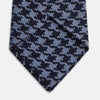 View 3 of product The Turnbull & Asser Navy and Blue Houndstooth Wool Blend Tie features a stylish houndstooth pattern in navy and light blue.