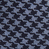 View 2 of product The Turnbull & Asser Navy and Blue Houndstooth Wool Blend Tie features a stylish houndstooth pattern in navy and light blue.