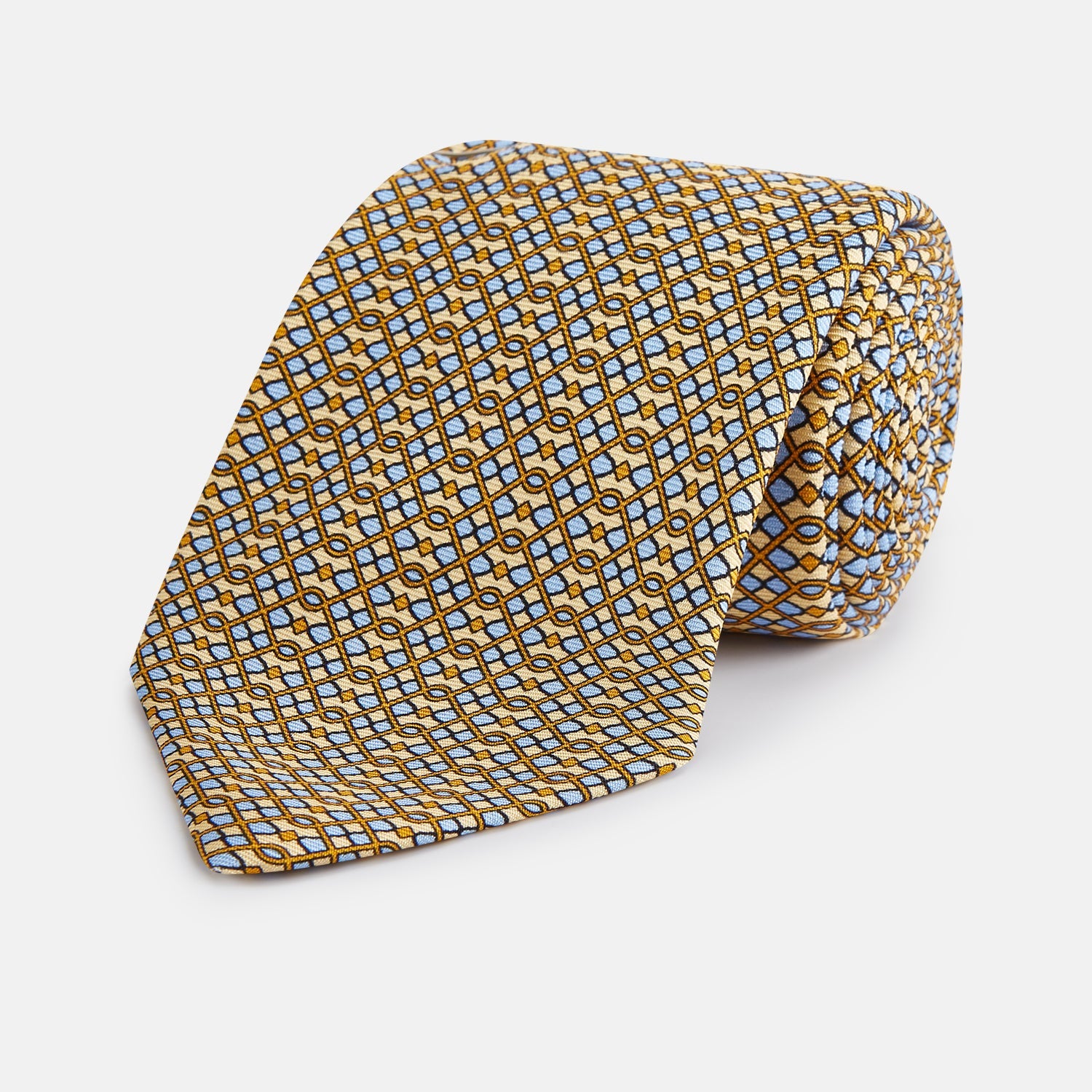 View 1 of product The Turnbull & Asser Yellow and Pale Blue Art Deco Silk Tie features interlocking yellow, blue, and black geometric shapes on white, adding a bold touch to any ensemble.