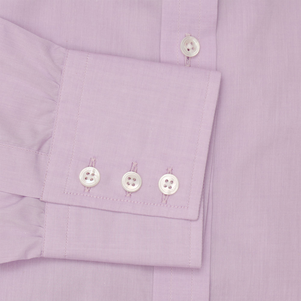 The Turnbull & Asser LILAC COTTON REGULAR FIT SHIRT is a long-sleeve, button-up cotton shirt with white buttons, a classic T&A collar, and cuffs, shown laid flat on a white background.