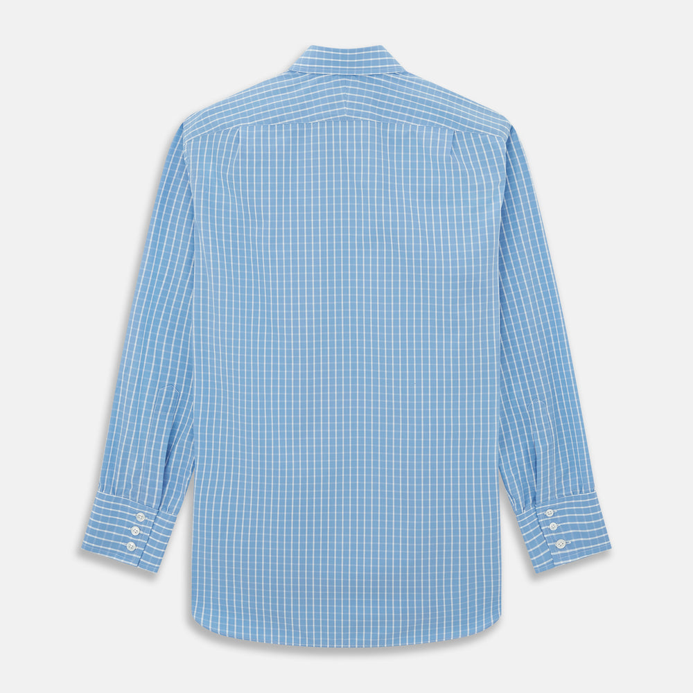 The Turnbull & Asser BLUE & WHITE CHECK COTTON REGULAR FIT SHIRT features long sleeves, a classic collar, white buttons, and a bold checkered pattern. Displayed on a white background.