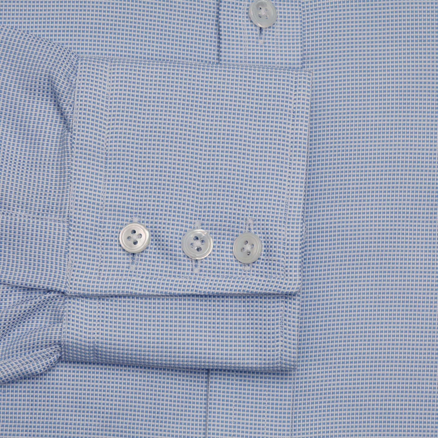 View 3 of product Turnbull & Asser's BLUE MULTI-CHECK COTTON REGULAR FIT SHIRT features a light blue check pattern, pointed collar, and white buttons—an essential classic for any men's wardrobe.