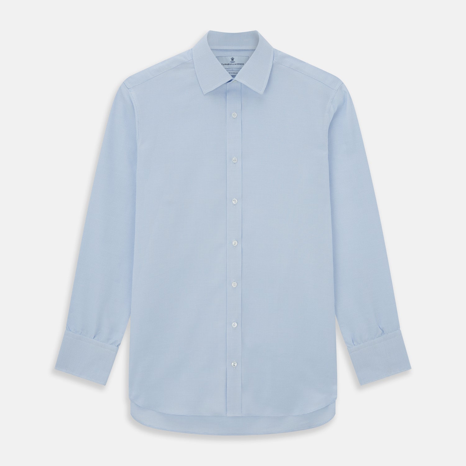 View 1 of product The Turnbull & Asser PALE BLUE MULTI-CHECK REGULAR FIT SHIRT features long sleeves, a pointed collar, and white buttons—a timeless essential for any men's wardrobe, shown laid flat on a white background.