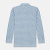 View 6 of product The Turnbull & Asser Blue Graph Overlay Check Piccadilly Shirt is a breathable cotton button-up featuring a collar, two chest pockets, white buttons, and an elegant blue graph check—perfect for the holidays.