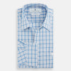 View 5 of product The Turnbull & Asser Blue Graph Overlay Check Piccadilly Shirt is a breathable cotton button-up featuring a collar, two chest pockets, white buttons, and an elegant blue graph check—perfect for the holidays.