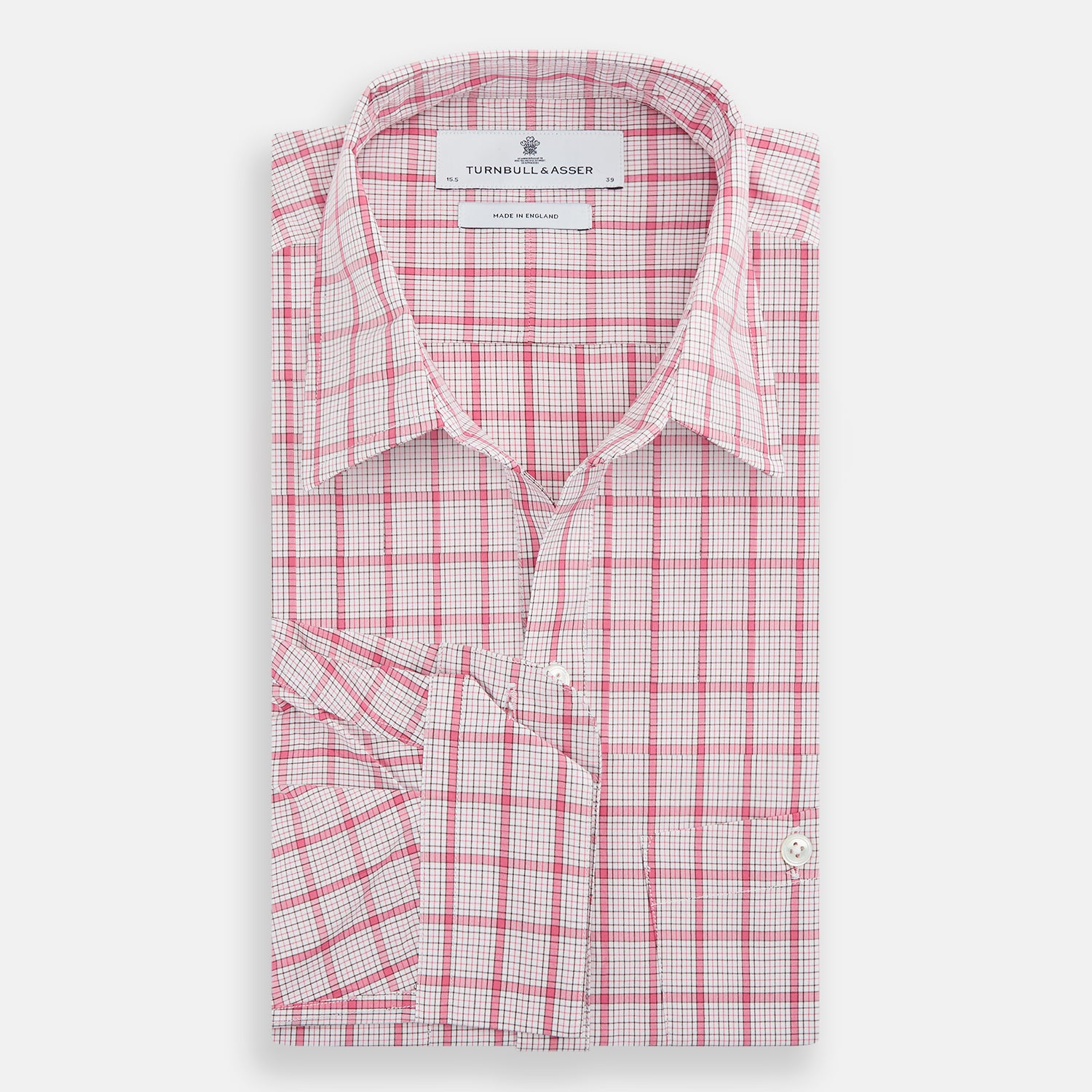 View 5 of product The Pink Graph Overlay Check Piccadilly Shirt by Turnbull & Asser features long sleeves, a button-up front, collar, and chest pockets—a stylish cotton option in a red and white check pattern for the holidays.