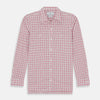 View 1 of product The Pink Graph Overlay Check Piccadilly Shirt by Turnbull & Asser features long sleeves, a button-up front, collar, and chest pockets—a stylish cotton option in a red and white check pattern for the holidays.