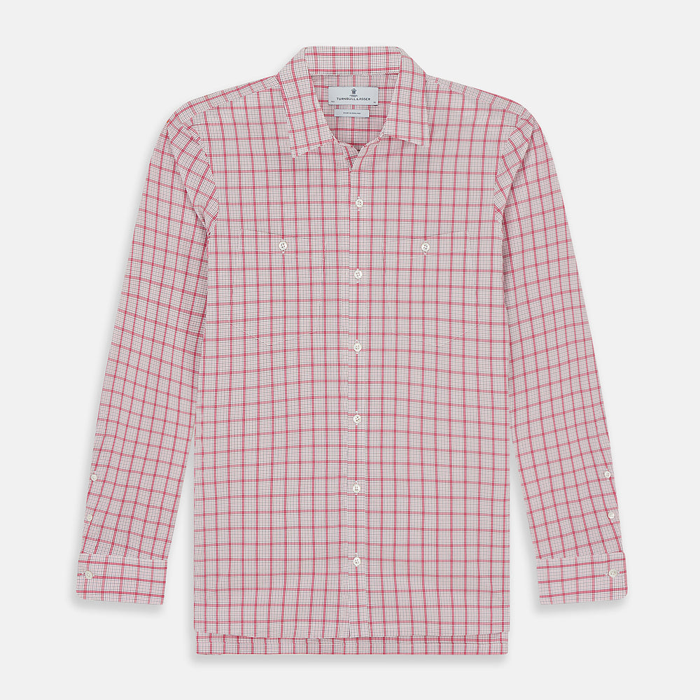 The Pink Graph Overlay Check Piccadilly Shirt by Turnbull & Asser features long sleeves, a button-up front, collar, and chest pockets—a stylish cotton option in a red and white check pattern for the holidays.