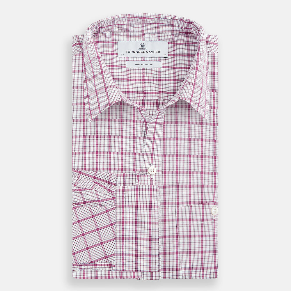 The Turnbull & Asser Purple Graph Overlay Check Piccadilly Shirt, a long-sleeve cotton button-up with two buttoned chest pockets, is neatly laid flat on a plain white background.