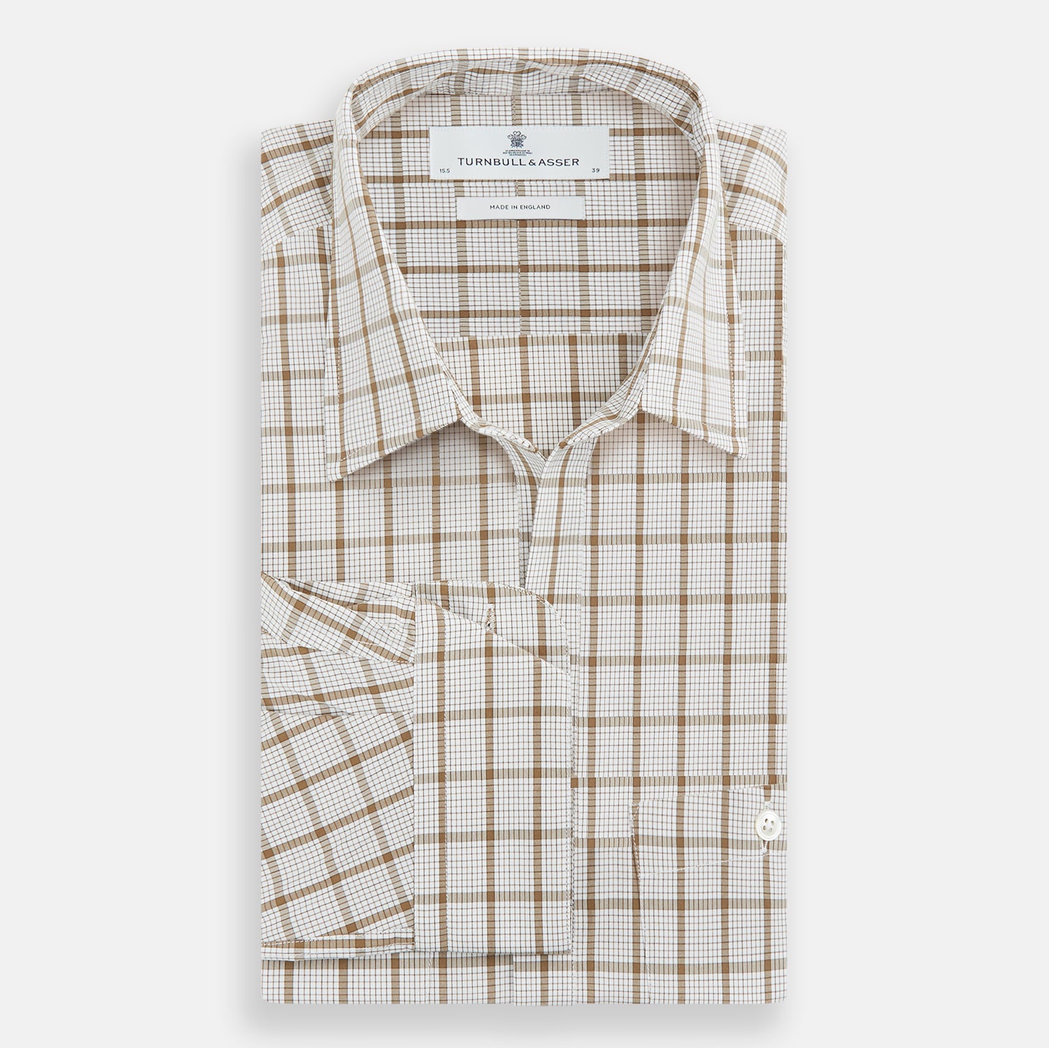 View 5 of product The Turnbull & Asser Brown Graph Overlay Check Piccadilly Shirt is a breathable cotton long-sleeve button-up with two chest pockets, in a beige and brown check pattern—ideal as your holiday fit shirt.