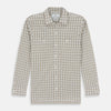 View 1 of product The Turnbull & Asser Brown Graph Overlay Check Piccadilly Shirt is a breathable cotton long-sleeve button-up with two chest pockets, in a beige and brown check pattern—ideal as your holiday fit shirt.