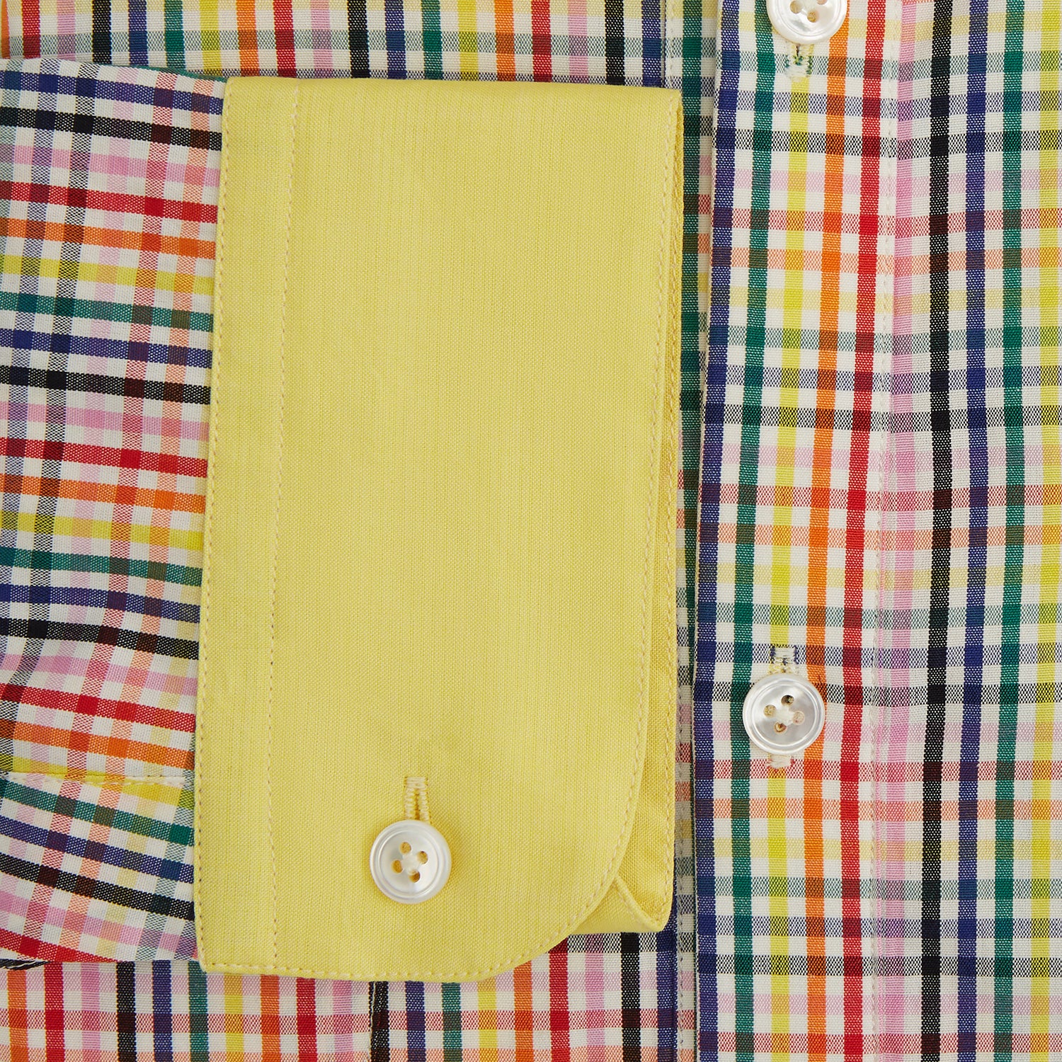 View 3 of product The Portobello Shirt by Turnbull & Asser is a long-sleeve, button-up with a vibrant red, blue, yellow, and green check pattern and a solid yellow collar—ideal for a market-inspired holiday look.