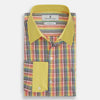 View 4 of product The Portobello Shirt by Turnbull & Asser is a long-sleeve, button-up with a vibrant red, blue, yellow, and green check pattern and a solid yellow collar—ideal for a market-inspired holiday look.