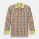 The Portobello Shirt by Turnbull & Asser is a long-sleeve, button-up with a vibrant red, blue, yellow, and green check pattern and a solid yellow collar—ideal for a market-inspired holiday look.