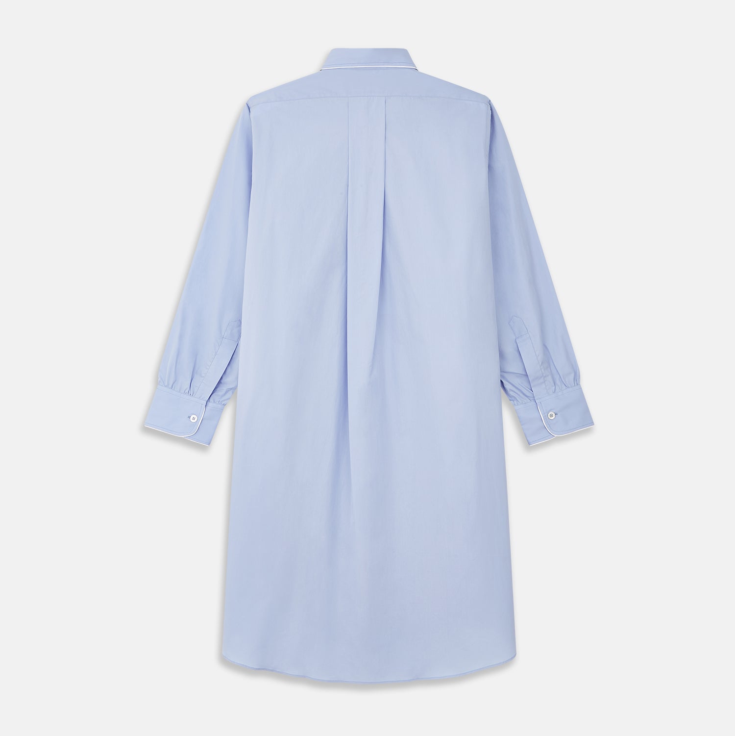 View 5 of product The Turnbull & Asser Blue Piped Sea Island Quality Cotton Nightshirt features light blue sea island cotton, a collared neckline with white piping, a front pocket, partial button placket, and a curved high-low hem for classic nightshirt style.