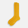 View 2 of product A single Yellow Mid-Length Merino Sock from Turnbull & Asser stands upright against a plain white background.