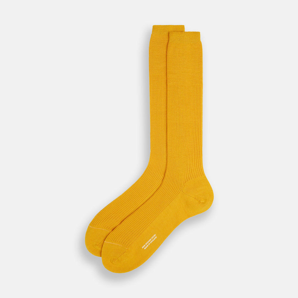 A single Yellow Mid-Length Merino Sock from Turnbull & Asser stands upright against a plain white background.