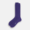 View 2 of product The Turnbull & Asser Violet Mid-Length Merino Socks, crafted from luxurious merino wool, feature a knee-high ribbed design and are shown upright against a plain white background.