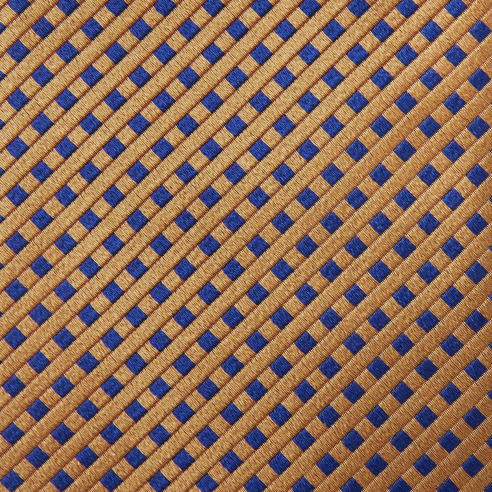 The Turnbull & Asser Tomorrow Never Dies Diamond Silk Tie, as seen on James Bond, features a gold and navy checkered pattern—an ideal gift for any Bond fan. Displayed rolled against a plain white background.