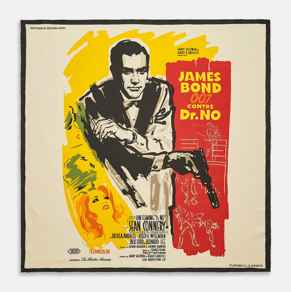 Vintage French James Bond 007 Dr. No poster featuring Sean Connery inspires the Turnbull & Asser DR. NO Yellow and Blue Poster Silk Pocket Square—handmade in England with bold illustrated colors.