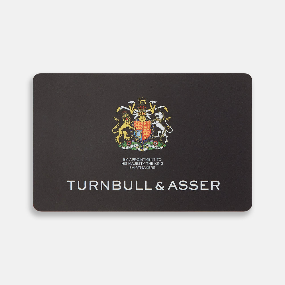 The Turnbull & Asser Gift Card (UK Only) is a black luxury card featuring a colorful royal crest, the words "By Appointment to His Majesty The King Shirtmakers," and "Turnbull & Asser" in bold white at the bottom.