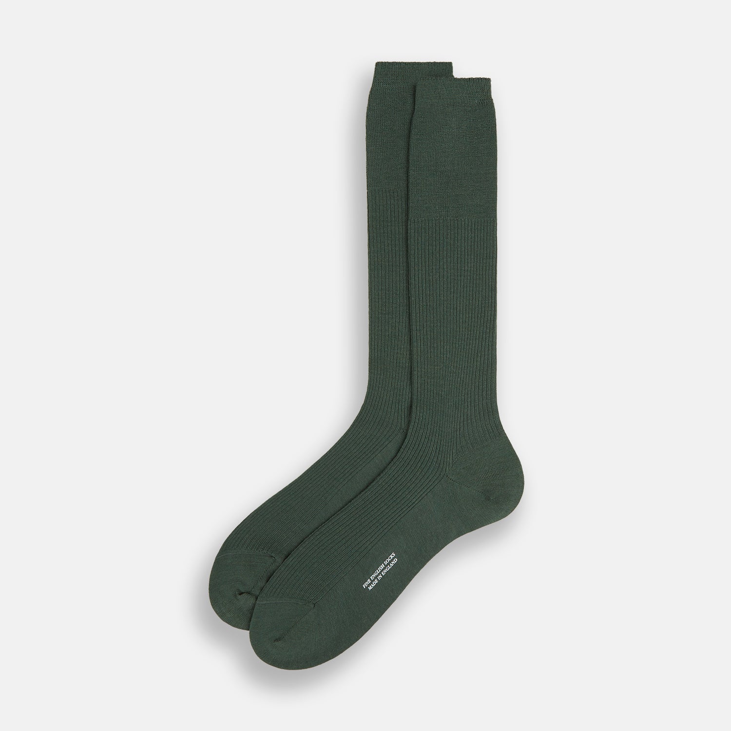 View 2 of product A single Fern Green Mid-Length Merino Sock by Turnbull & Asser, featuring a ribbed texture, is displayed on a plain white background at a slight angle to highlight its premium wool fabric, shape, and length.