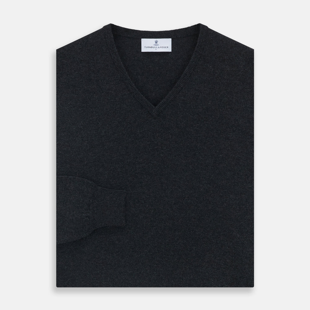 The Turnbull & Asser Charcoal V-Neck Cashmere Jumper, featuring long sleeves, is displayed flat on a white background.