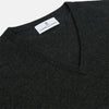 View 2 of product The Turnbull & Asser Charcoal V-Neck Cashmere Jumper, featuring long sleeves, is displayed flat on a white background.