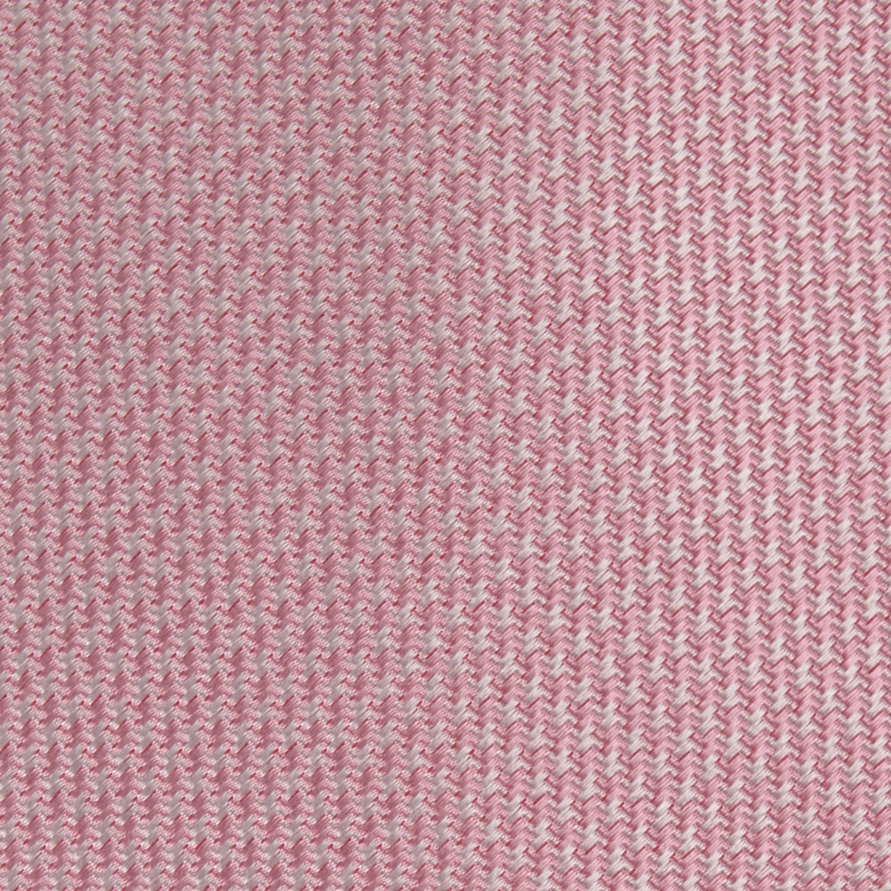 The Turnbull & Asser Pink Houndstooth Silk Tie, featuring a subtle textured pattern, is rolled up and displayed on a plain white background—ideal for pairing with your favorite office shirt.