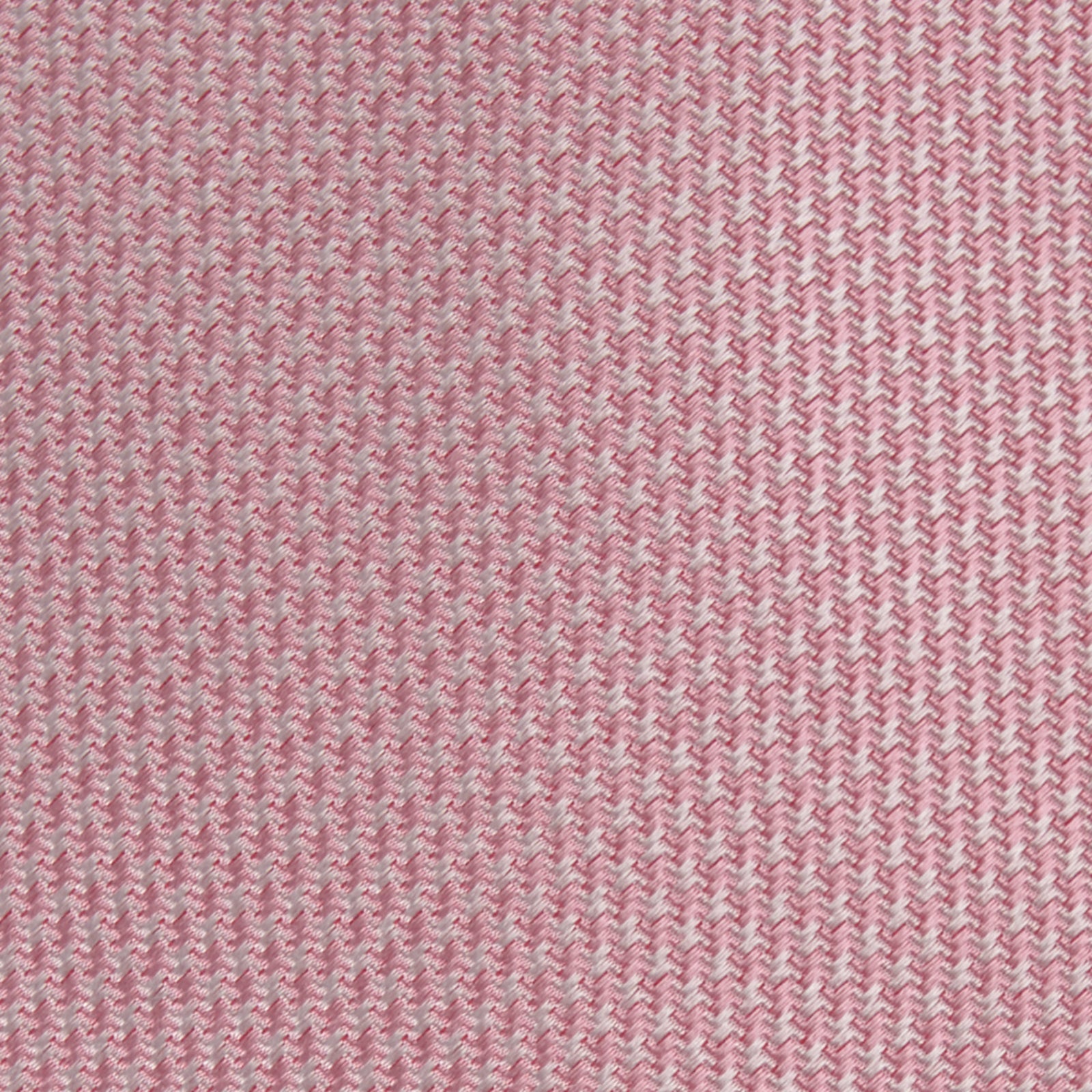 View 3 of product The Turnbull & Asser Pink Houndstooth Silk Tie, featuring a subtle textured pattern, is rolled up and displayed on a plain white background—ideal for pairing with your favorite office shirt.