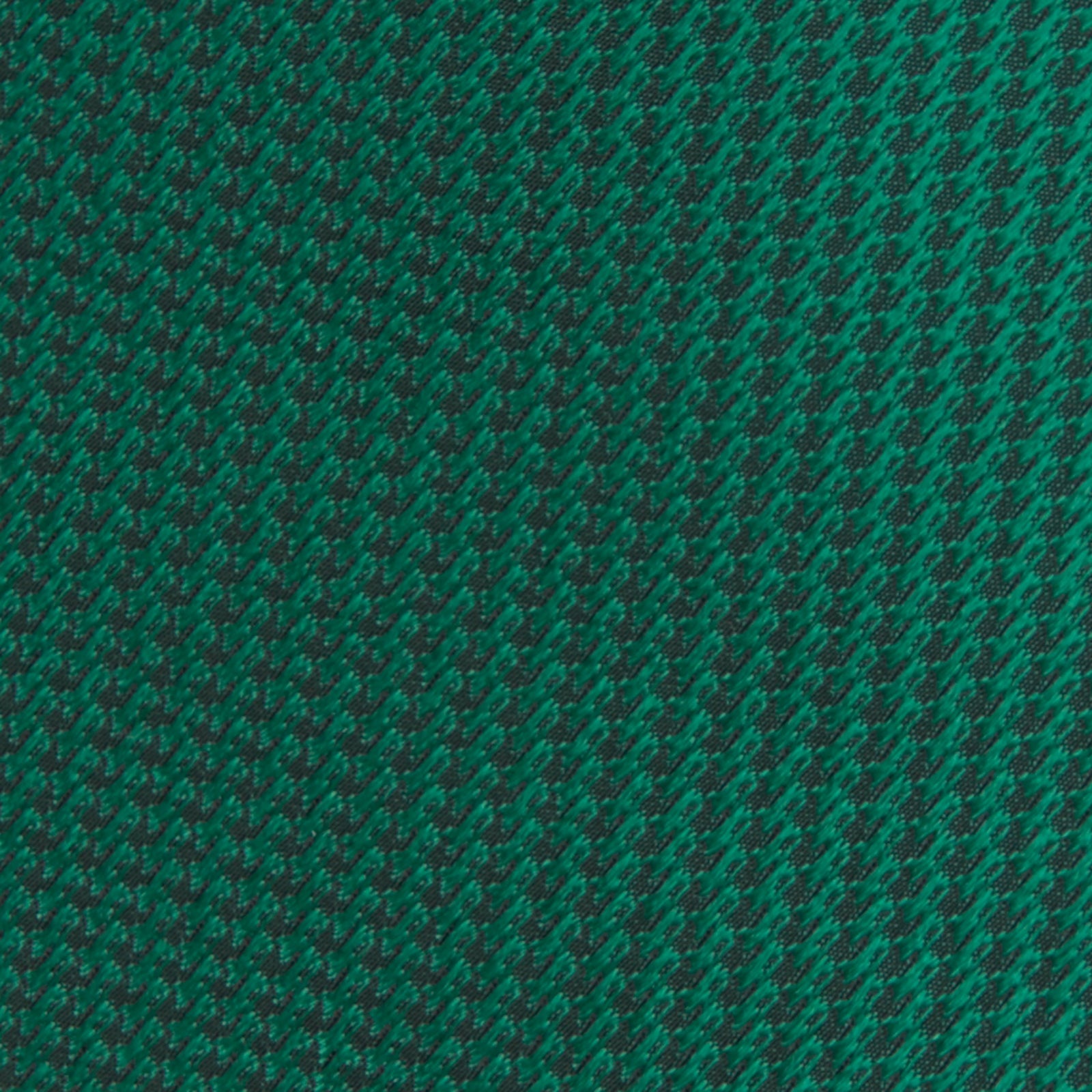 View 3 of product The Turnbull & Asser Green Lace Silk Tie, featuring a textured lace weave, is neatly rolled and displayed on a white background—an elegant, versatile accessory for any wardrobe.