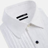 View 2 of product The Casino Royale White Dress Shirt in Cotton by Turnbull & Asser UK is a long-sleeve white dress shirt, crafted from crisp white cotton poplin with a pleated bib front, black buttons, and a classic collar, shown laid flat on a white background.