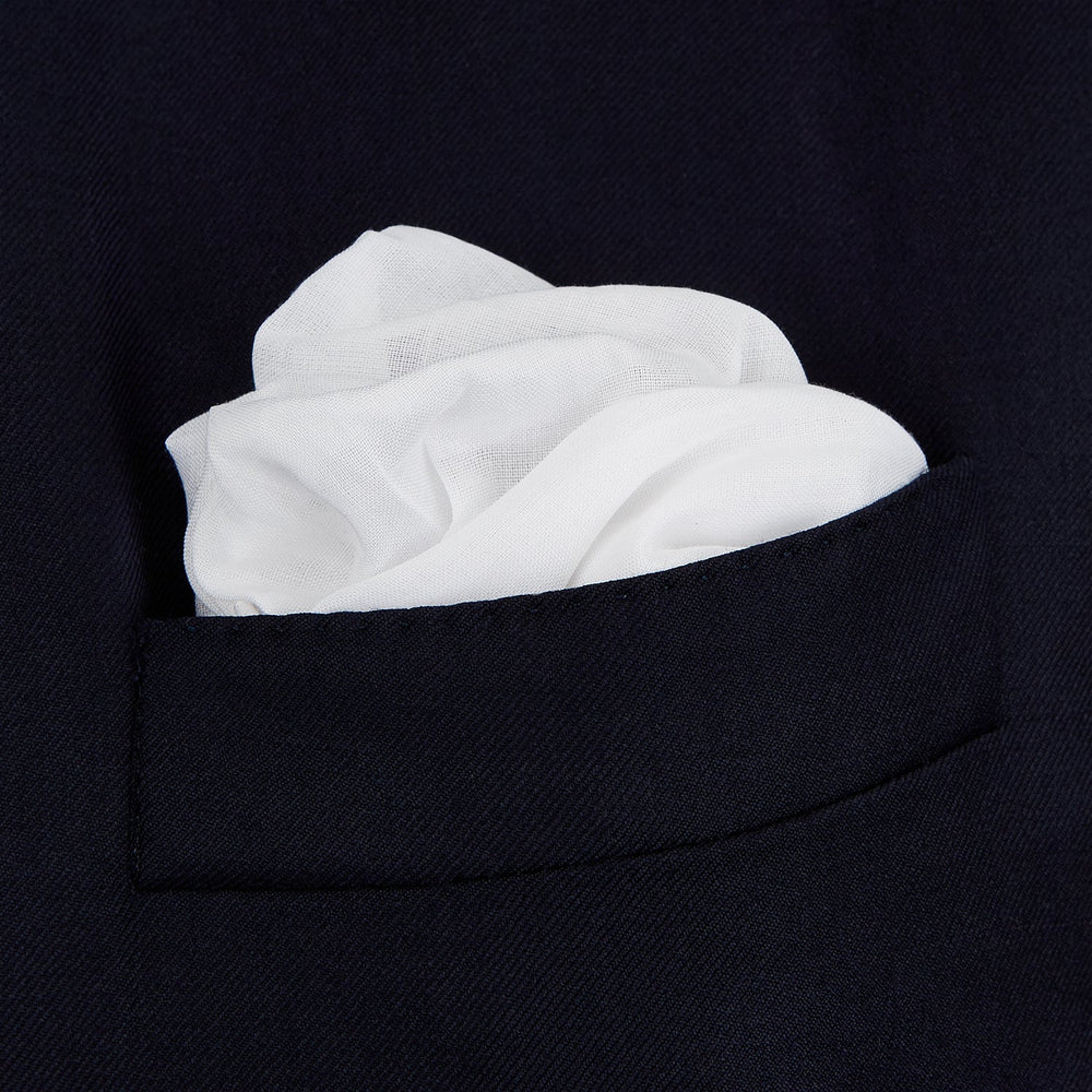 The James Bond Voile Pocket Square by Turnbull & Asser, in plain white with hand-rolled edges, is neatly folded and laid flat on a white background—a classic accessory for timeless style.