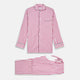 The Turnbull & Asser Pink Candy Stripe Cotton Traditional Pyjamas feature long sleeves, pants, vertical pink candy stripes, a camp collar shirt with buttons, chest pocket, and navy trim on the pocket and cuffs.