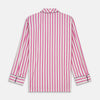 View 8 of product The Turnbull & Asser Pink Candy Stripe Cotton Traditional Pyjamas feature long sleeves, pants, vertical pink candy stripes, a camp collar shirt with buttons, chest pocket, and navy trim on the pocket and cuffs.