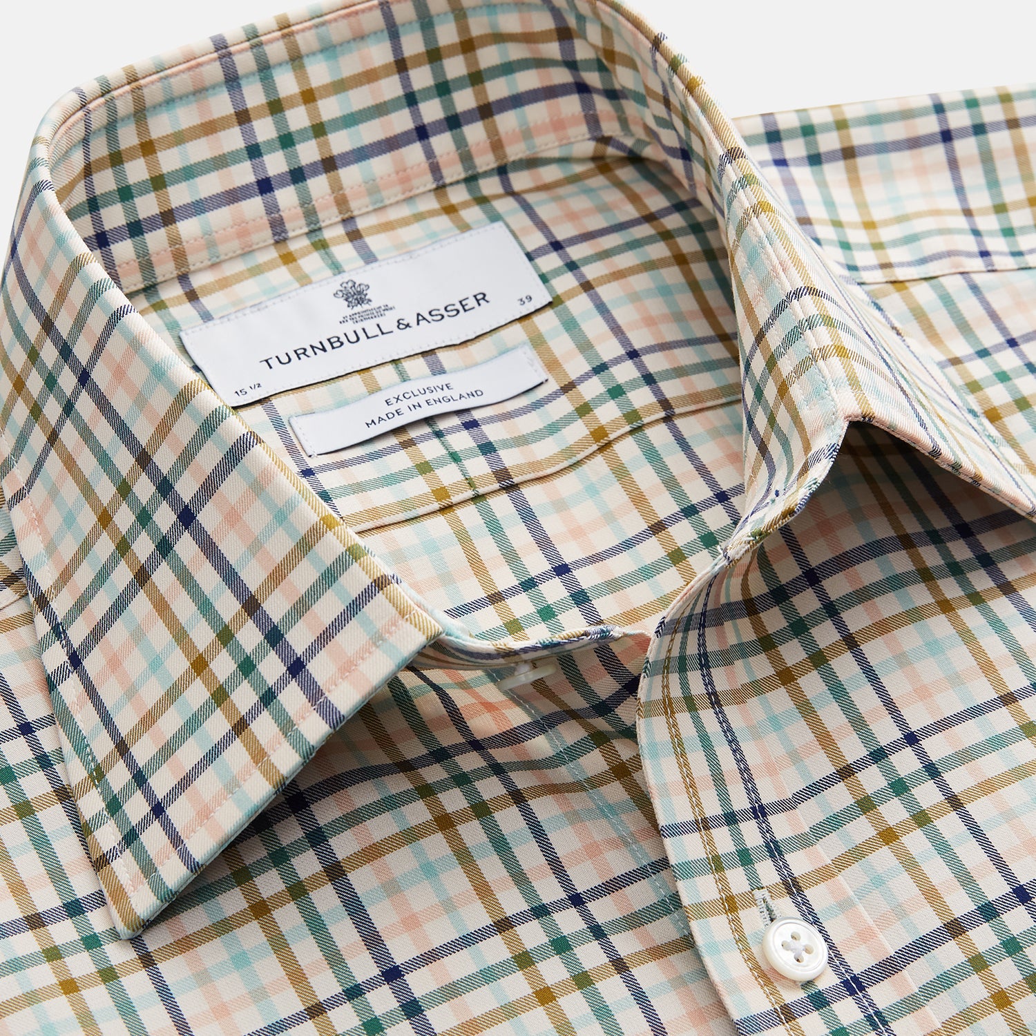 View 2 of product The Turnbull & Asser Green Multi Check Regular Fit Shirt features a T&A collar, 3 button cuffs, and a vibrant yellow, blue, and green check pattern on white. Inspired by Harriet Smith.