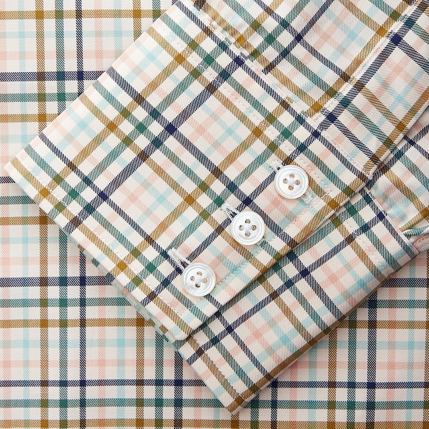 View 3 of product The Turnbull & Asser Green Multi Check Regular Fit Shirt features a T&A collar, 3 button cuffs, and a vibrant yellow, blue, and green check pattern on white. Inspired by Harriet Smith.