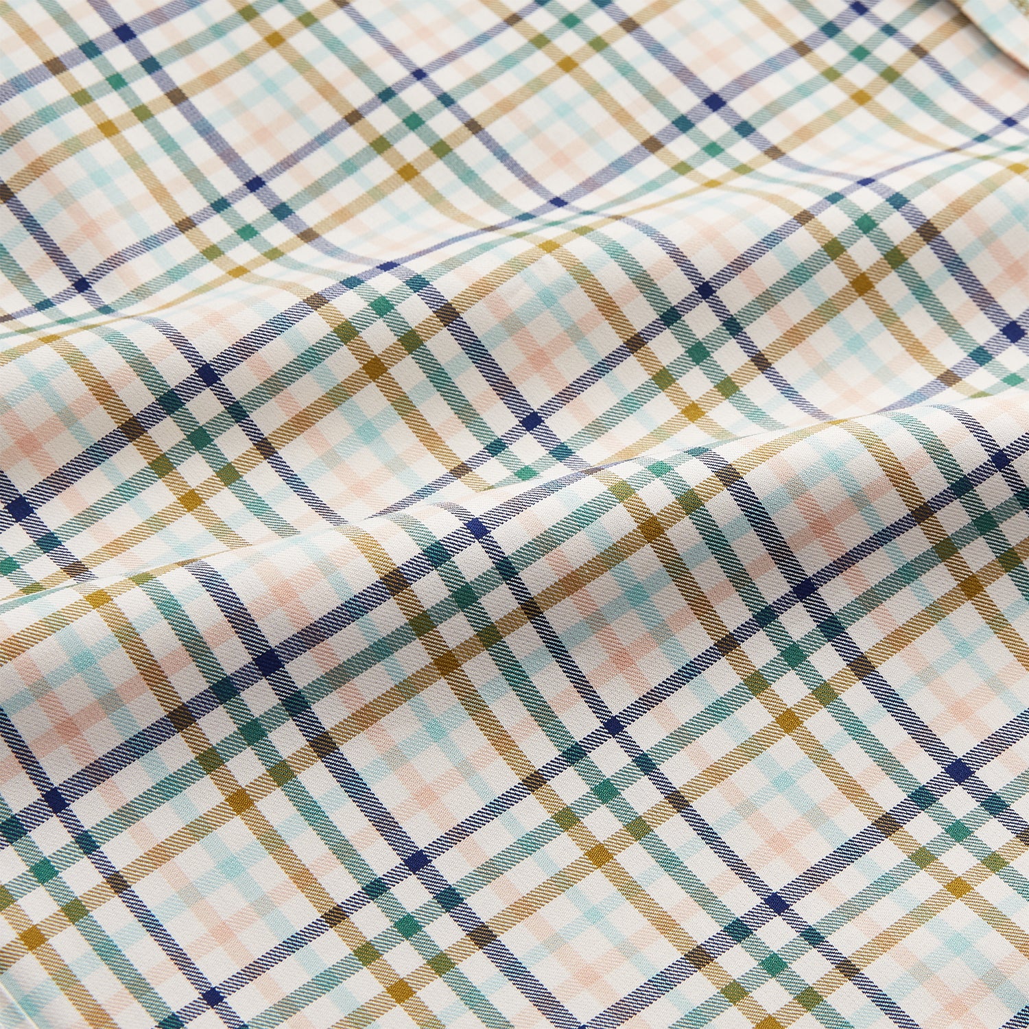 View 4 of product The Turnbull & Asser Green Multi Check Regular Fit Shirt features a T&A collar, 3 button cuffs, and a vibrant yellow, blue, and green check pattern on white. Inspired by Harriet Smith.