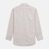 View 5 of product The Turnbull & Asser Red Multi Check Regular Fit Cotton-Cashmere Shirt features a T&A collar, 3 button cuffs, and a multicolored check pattern on white, shown laid flat against a white surface.