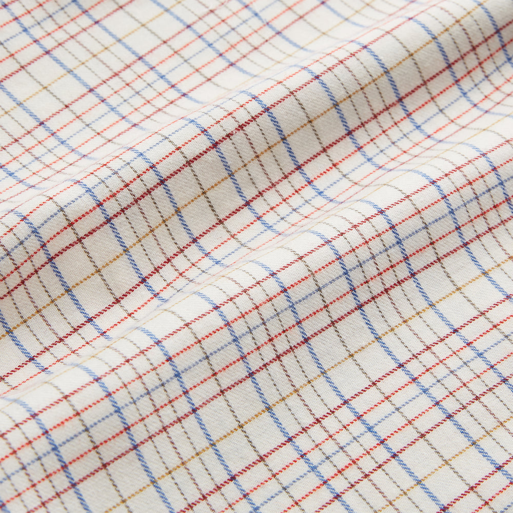 The Turnbull & Asser Red Multi Check Regular Fit Cotton-Cashmere Shirt features a T&A collar, 3 button cuffs, and a multicolored check pattern on white, shown laid flat against a white surface.