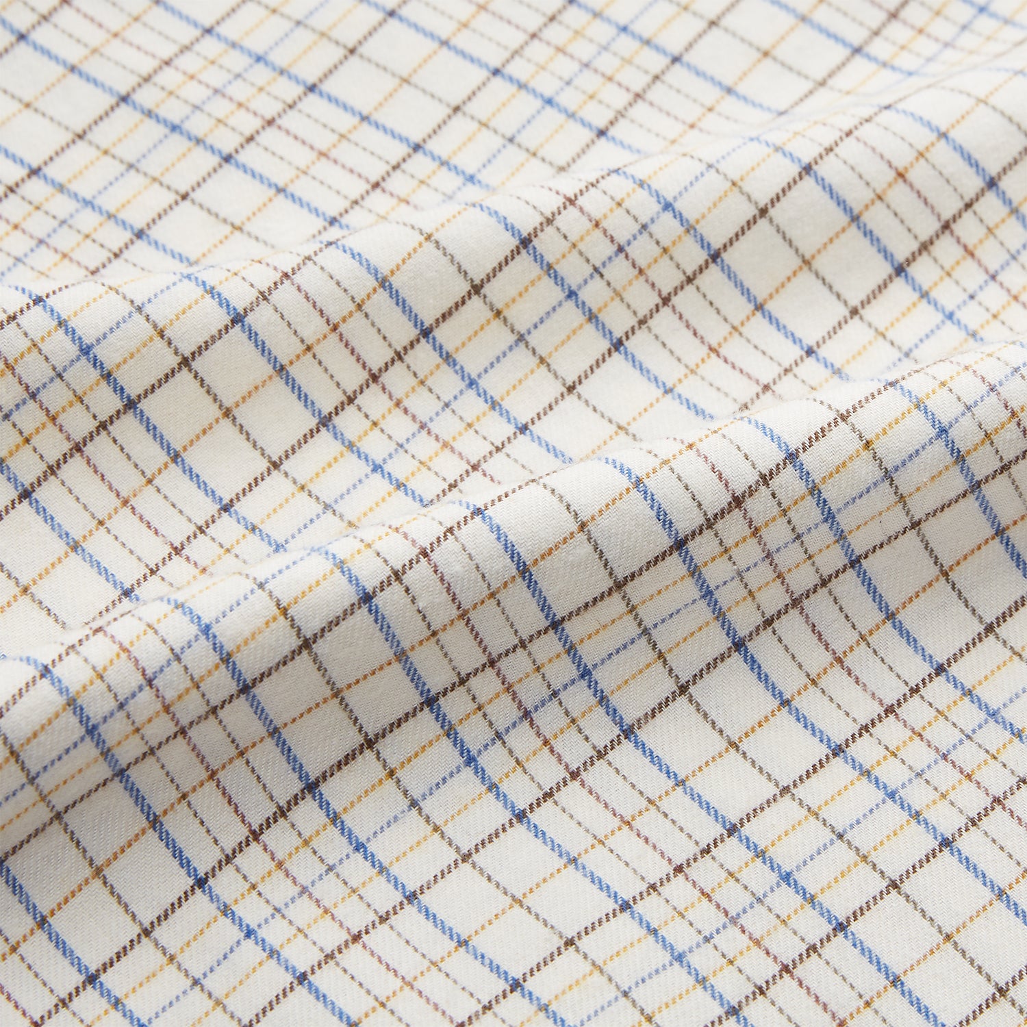 View 4 of product The Turnbull & Asser Brown Multi Check Regular Fit Cotton-Cashmere Shirt features a white base with blue, yellow, and brown checks, T&A collar, and 3 button cuffs for a smart-casual look.