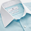 View 2 of product Green micro-check regular fit shirt by Turnbull & Asser, featuring a white T&A collar, double cuffs, and button-down front, laid flat on a white background.