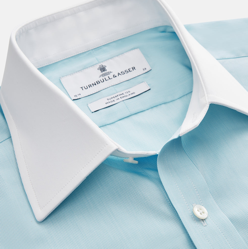 Green micro-check regular fit shirt by Turnbull & Asser, featuring a white T&A collar, double cuffs, and button-down front, laid flat on a white background.