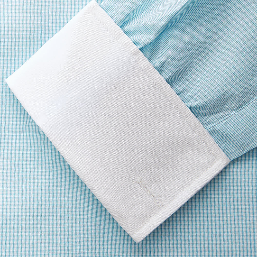 Green micro-check regular fit shirt by Turnbull & Asser, featuring a white T&A collar, double cuffs, and button-down front, laid flat on a white background.