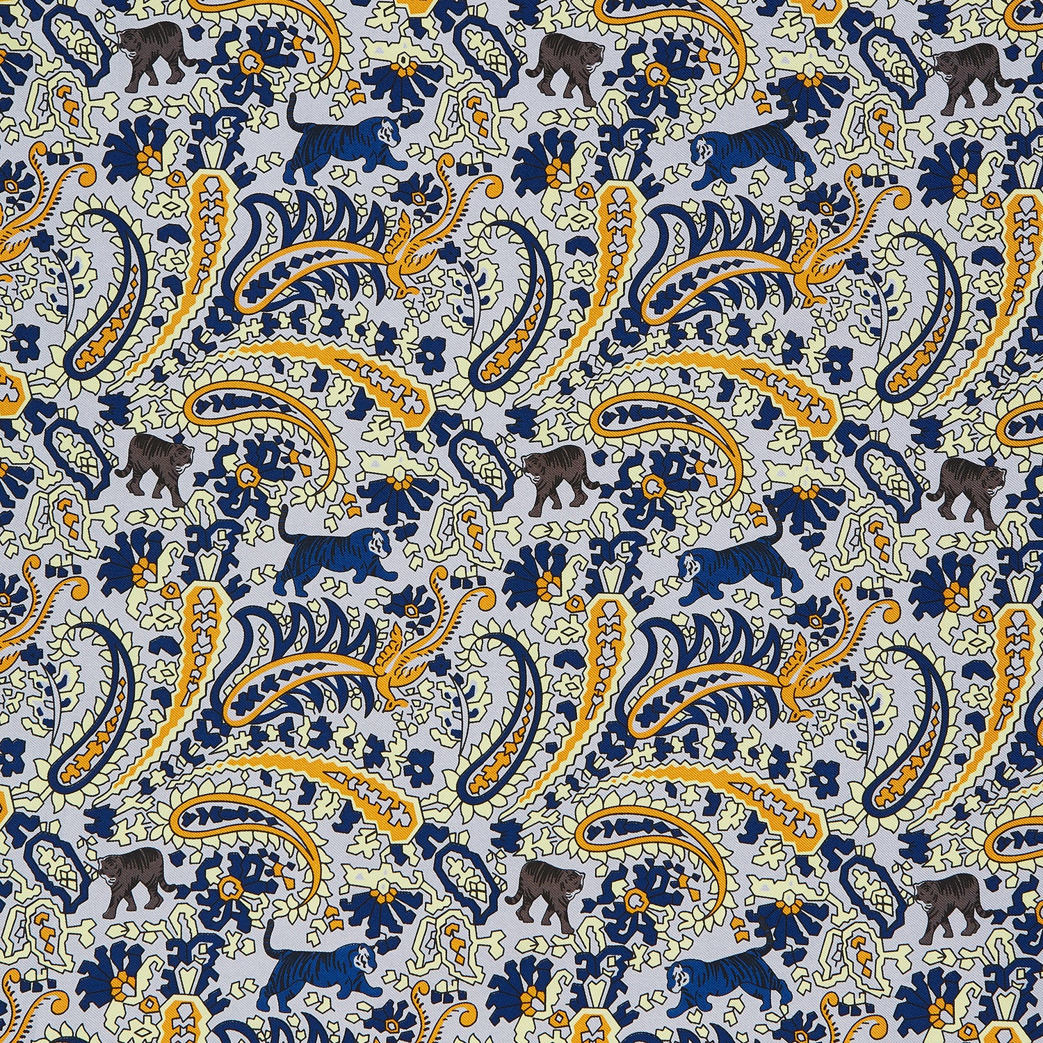 View 3 of product The Blue and Yellow Paisley Tiger Silk Pocket Square by Turnbull & Asser features a light blue base with paisley, elephants, tigers, and floral motifs—highlighted by a blue border. An elegant choice to pair with any Turnbull shirt.